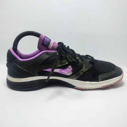 Nike Dual Fusion TR training shoe in a black and purple colorway.