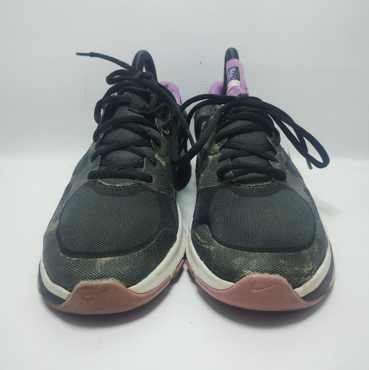 Nike Dual Fusion TR training shoe in a black and purple colorway.