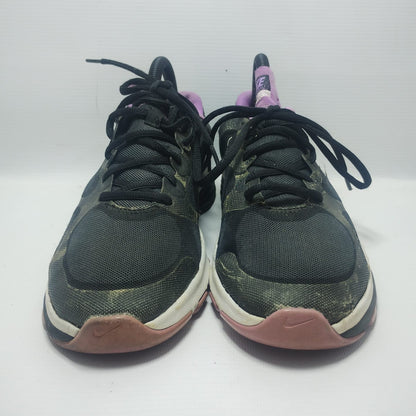 Nike Dual Fusion TR training shoe in a black and purple colorway.