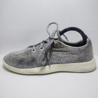 Allbirds Men's Wool Runner in a grey color with a white sole.
