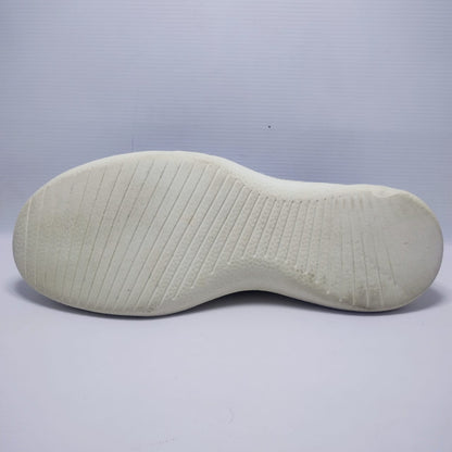 Allbirds Men's Wool Runner in a grey color with a white sole.