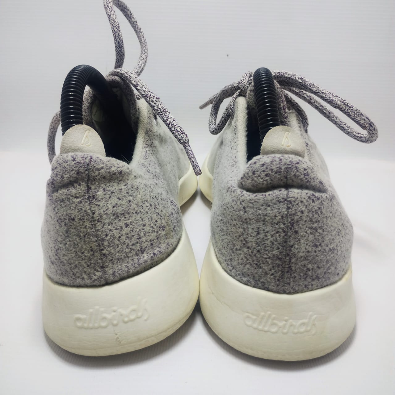 Allbirds Men's Wool Runner in a grey color with a white sole.