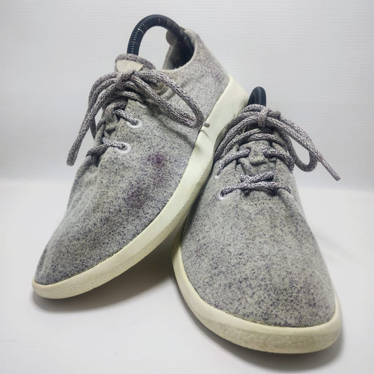 Allbirds Men's Wool Runner in a grey color with a white sole.