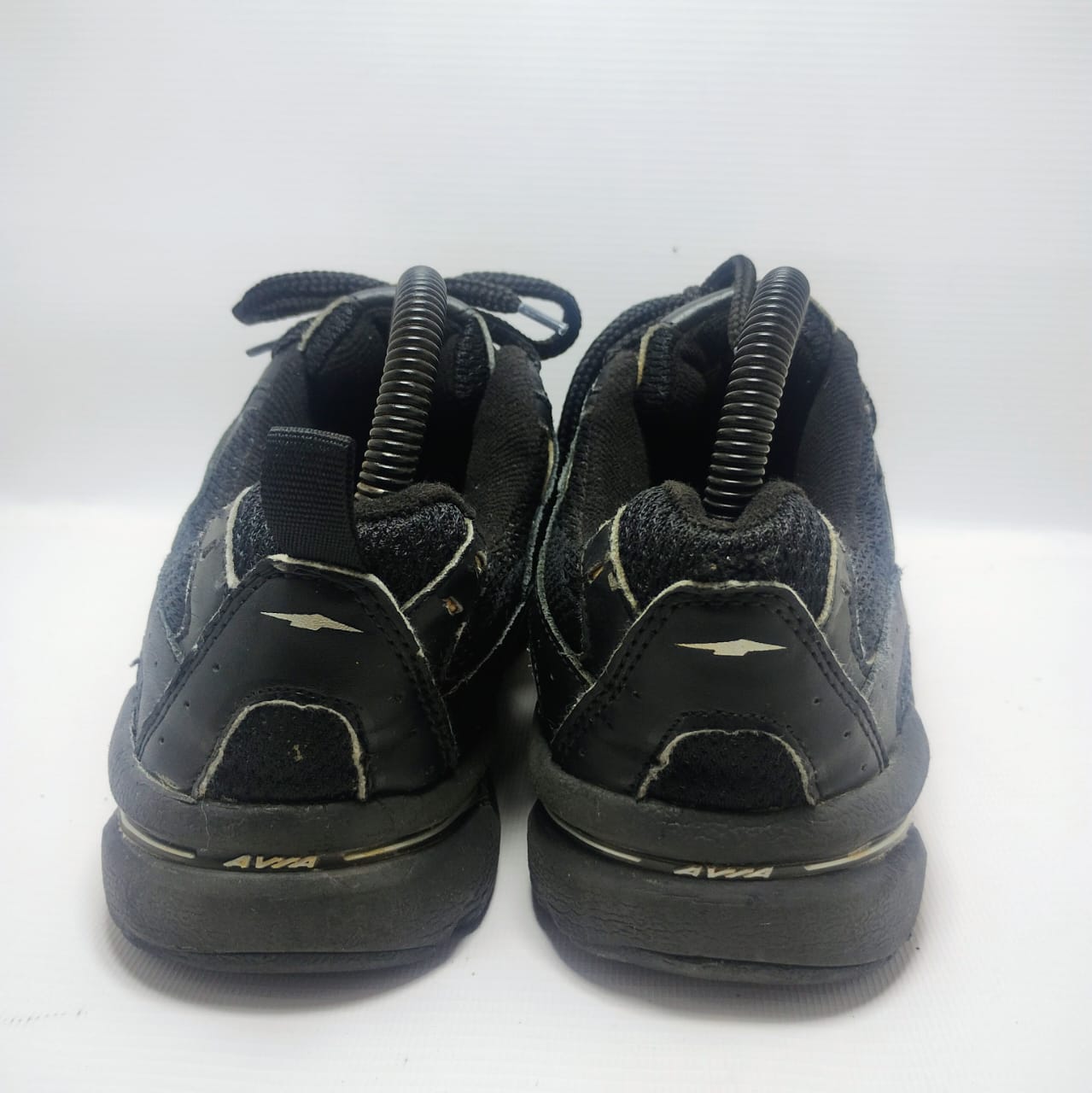 Avia men's athletic or walking shoe in black with yellow accents