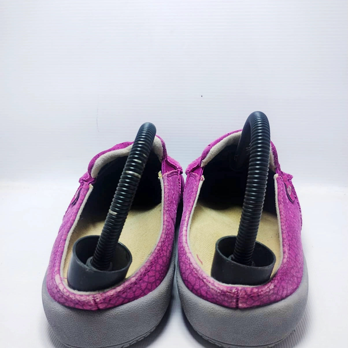 Spenco Siesta Slide Mosaic mules in a magenta/fuchsia color