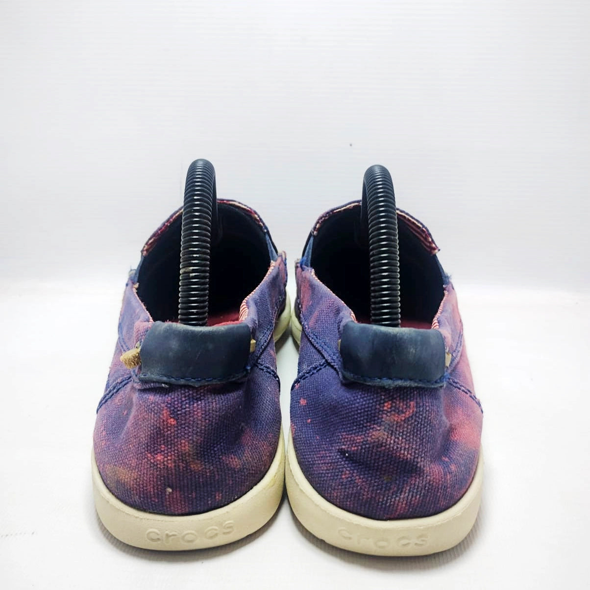 Crocs Walu canvas loafers in a purple and pink distressed colorway