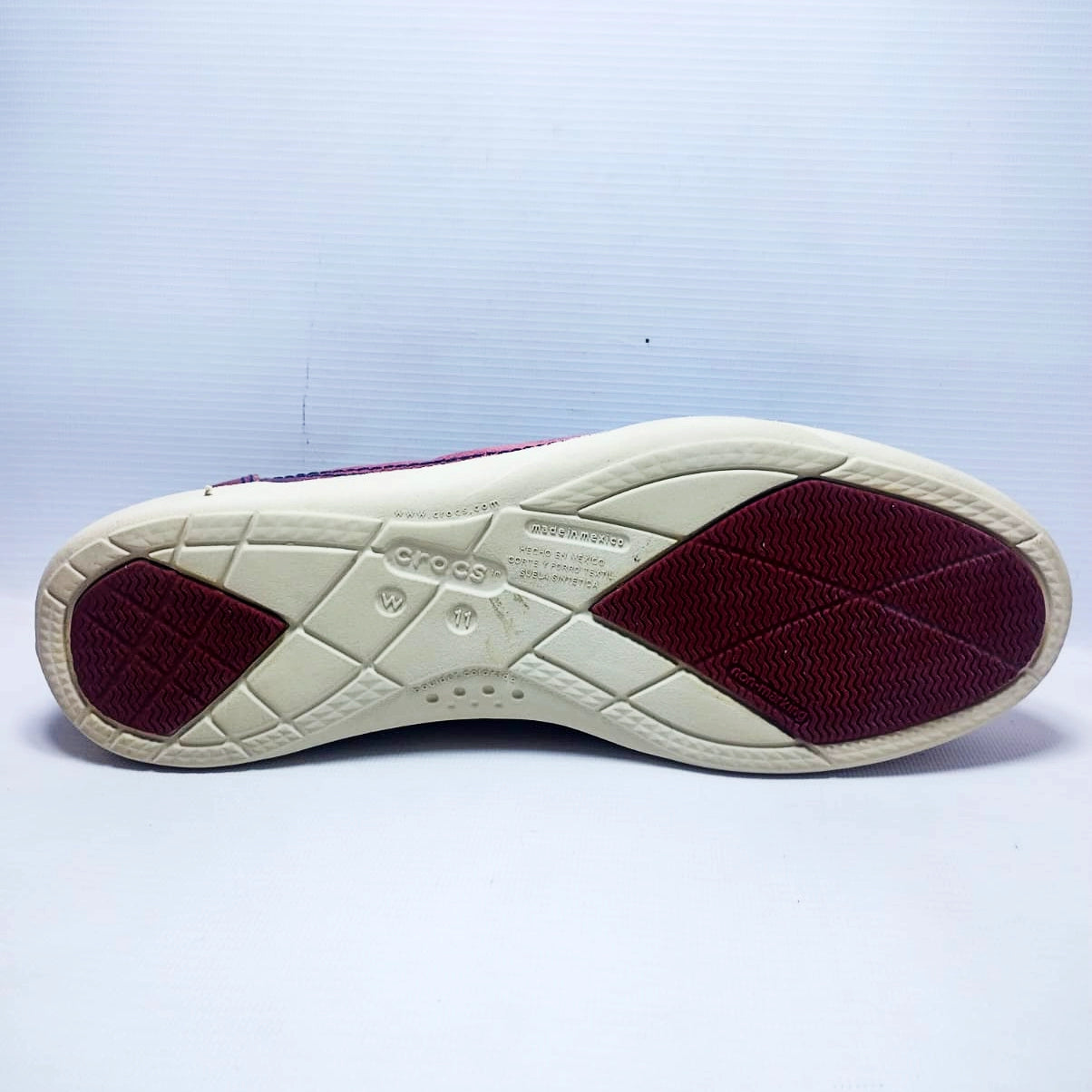 Crocs Walu canvas loafers in a purple and pink distressed colorway