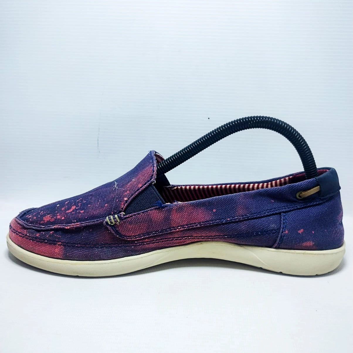 Crocs Walu canvas loafers in a purple and pink distressed colorway