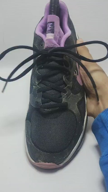 Nike Dual Fusion TR training shoe in a black and purple colorway.