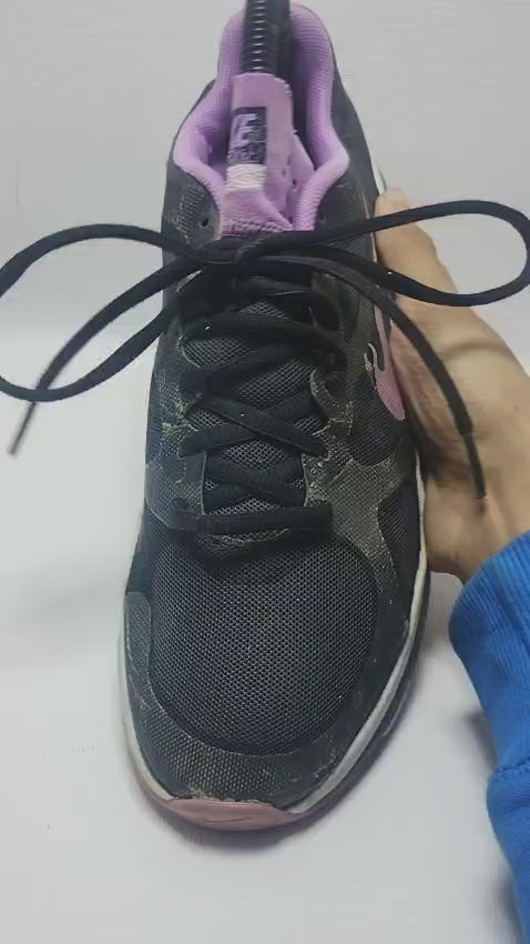 Nike Dual Fusion TR training shoe in a black and purple colorway.